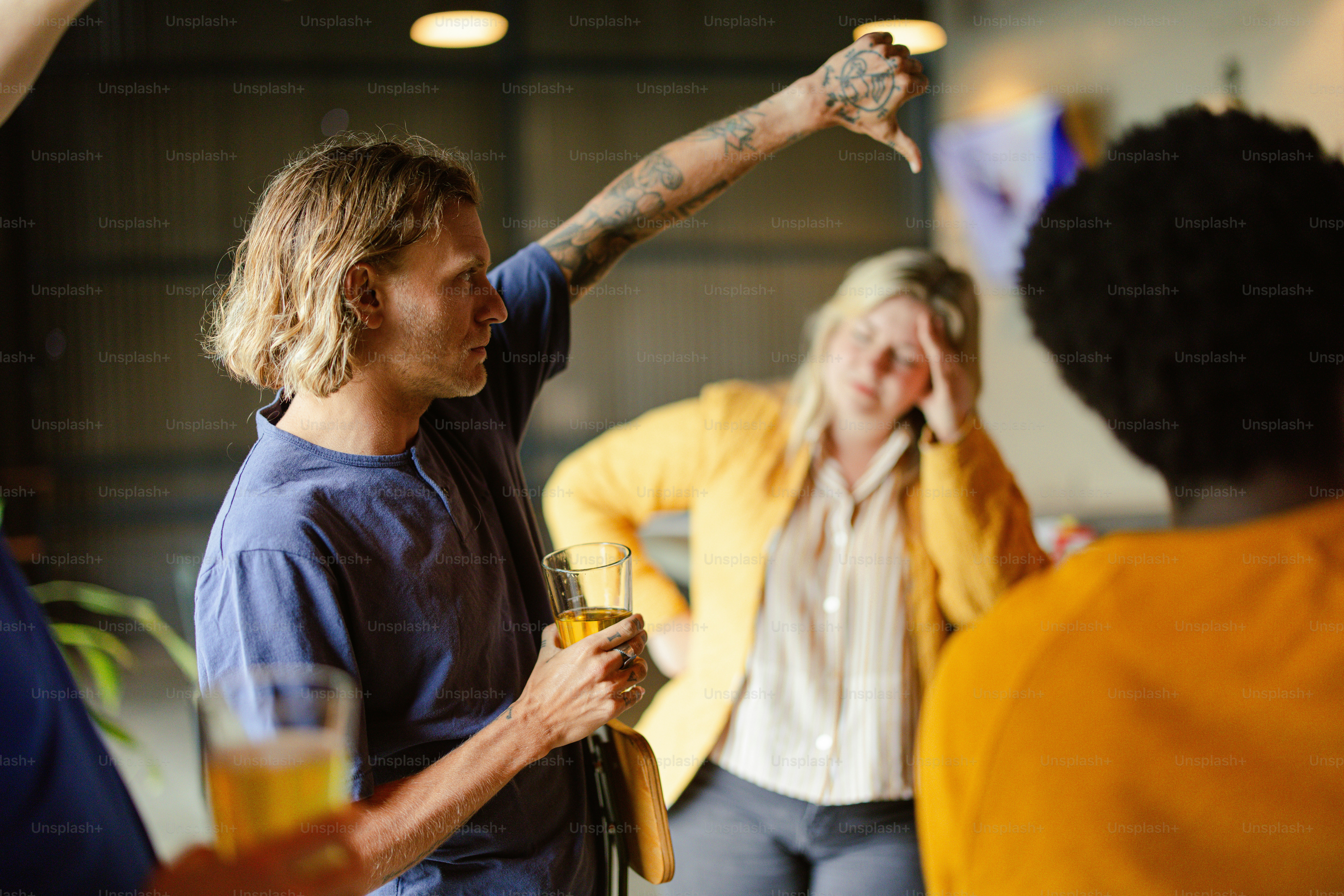 a group of people standing around each other