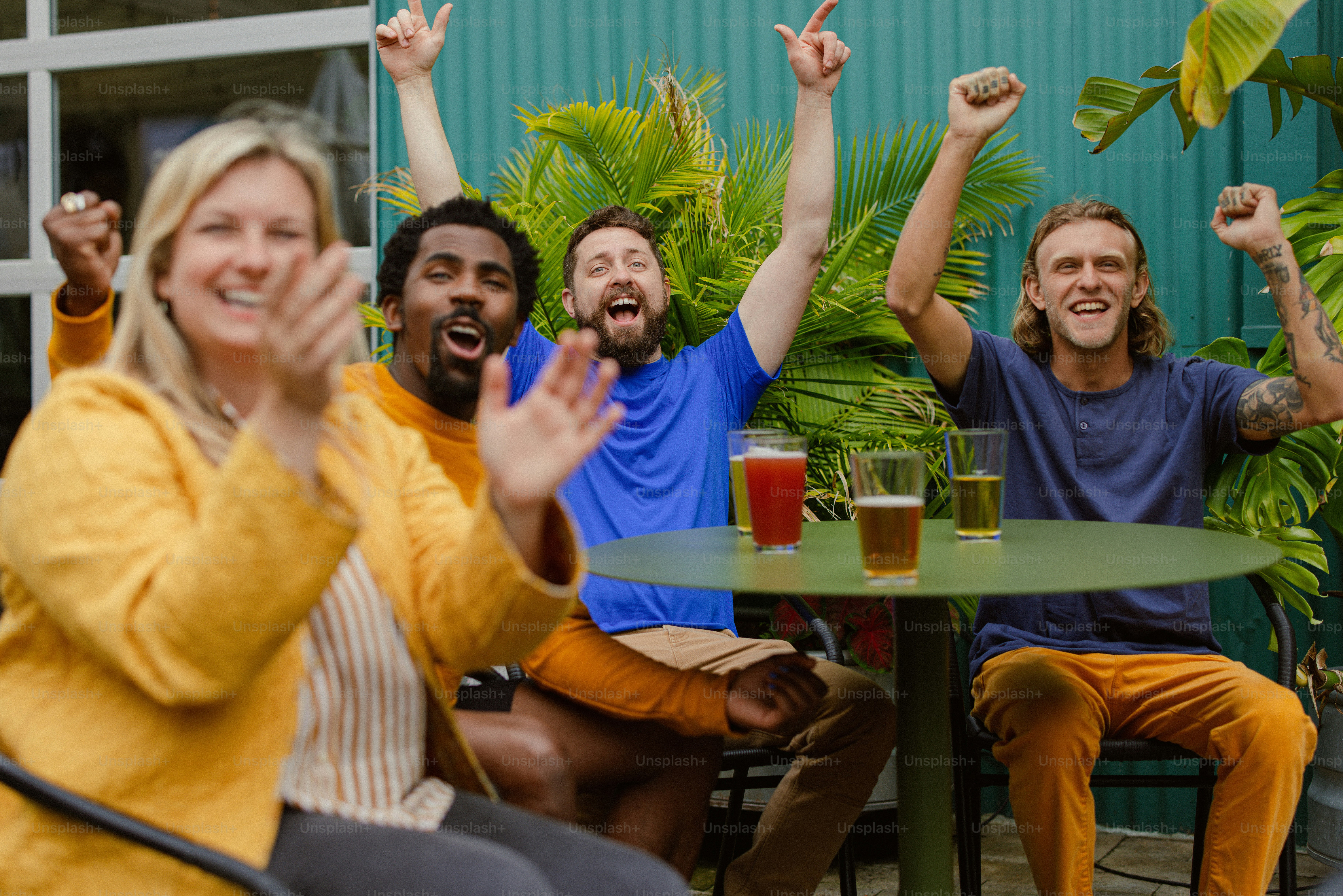 a group of people sitting around a table