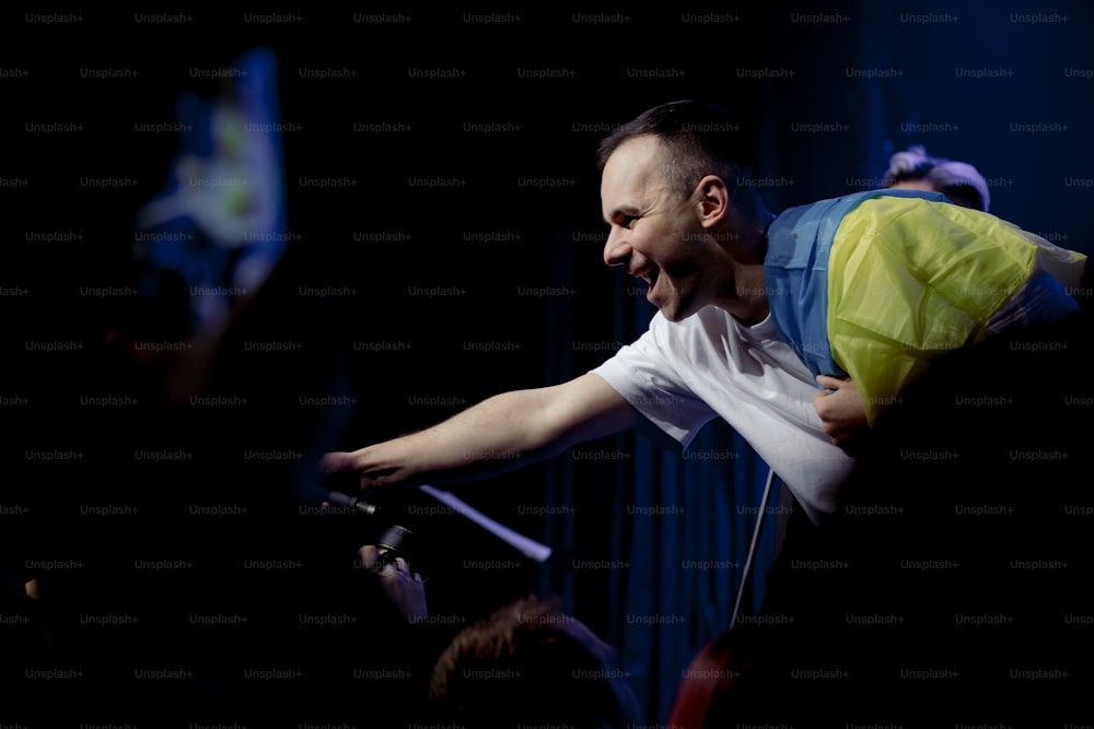 a man riding a bike on top of a stage