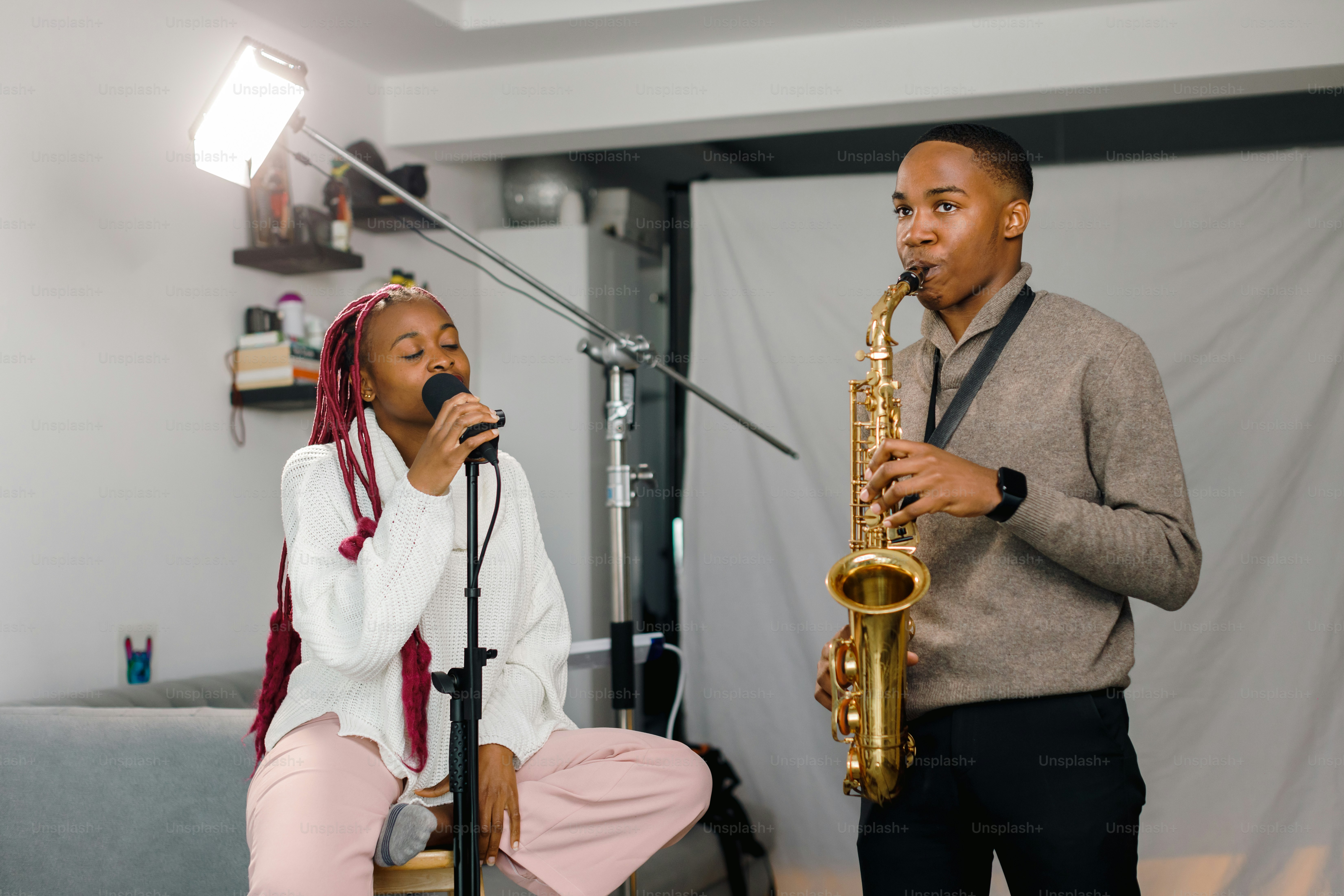 a couple of people that are playing instruments