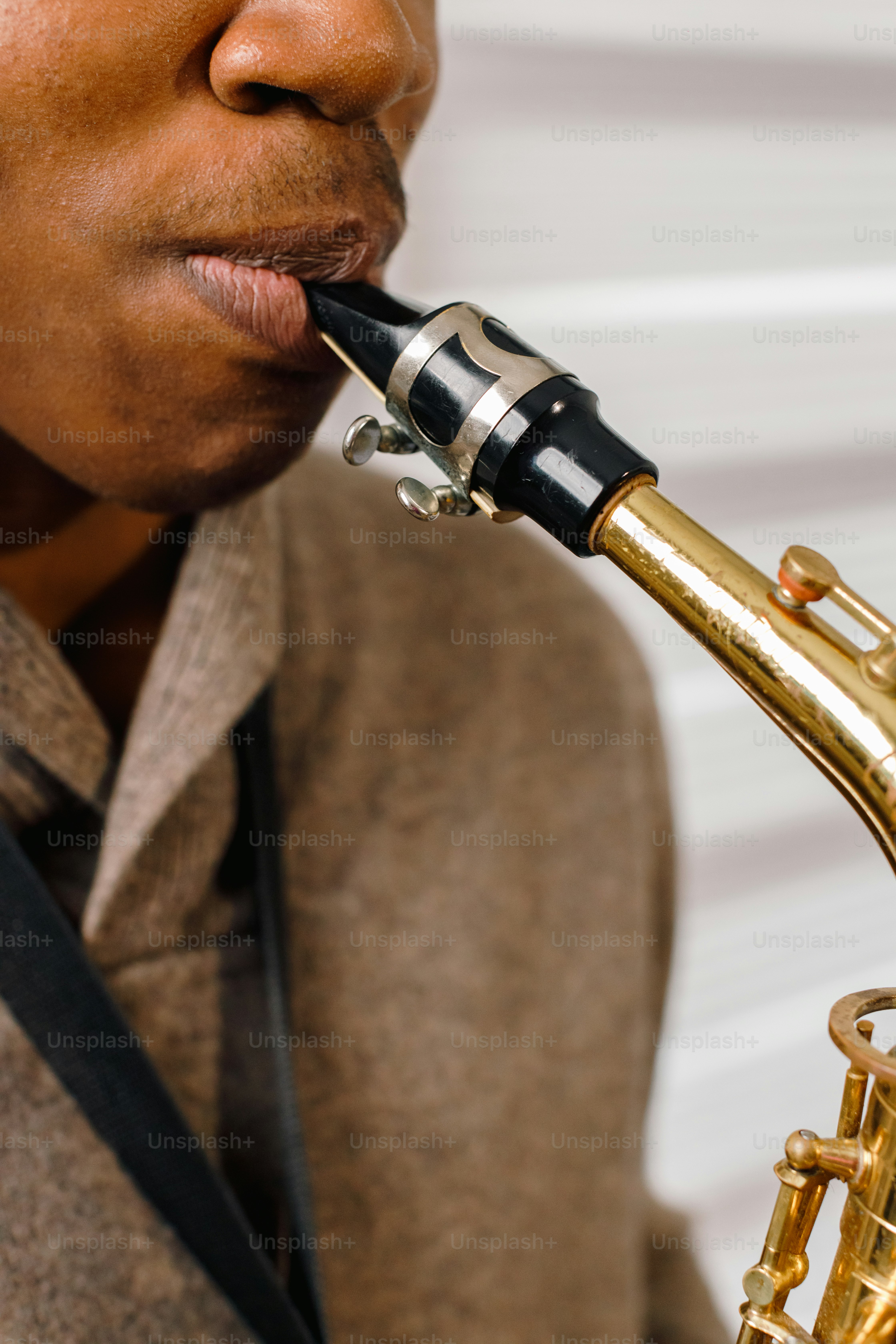 a close up of a person smoking a pipe