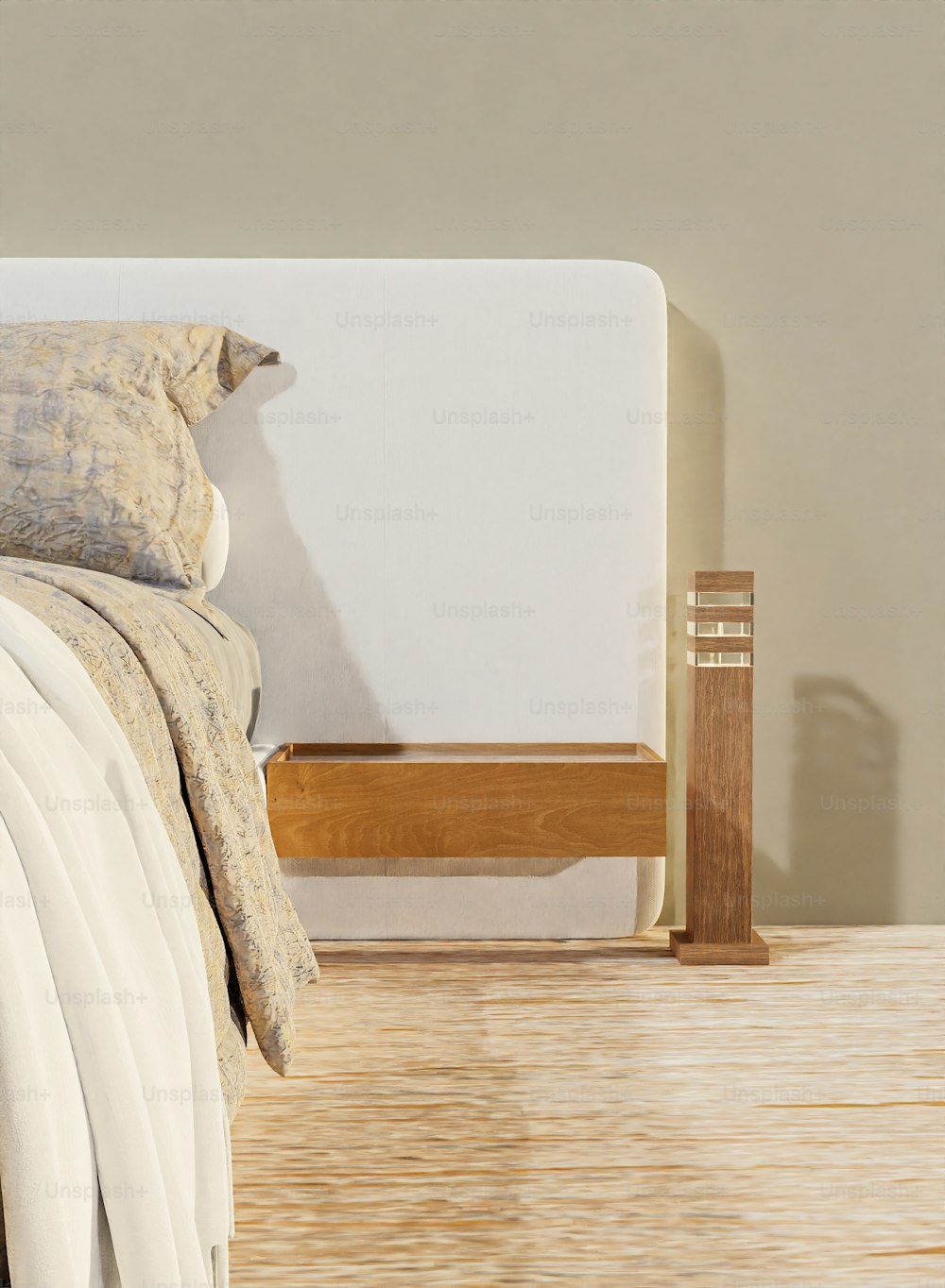 a bed with white sheets and a wooden headboard