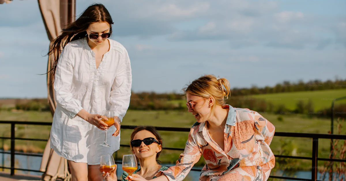 Group Standing Pool A group of people standing around a pool photo – Portrait Image on Unsplash