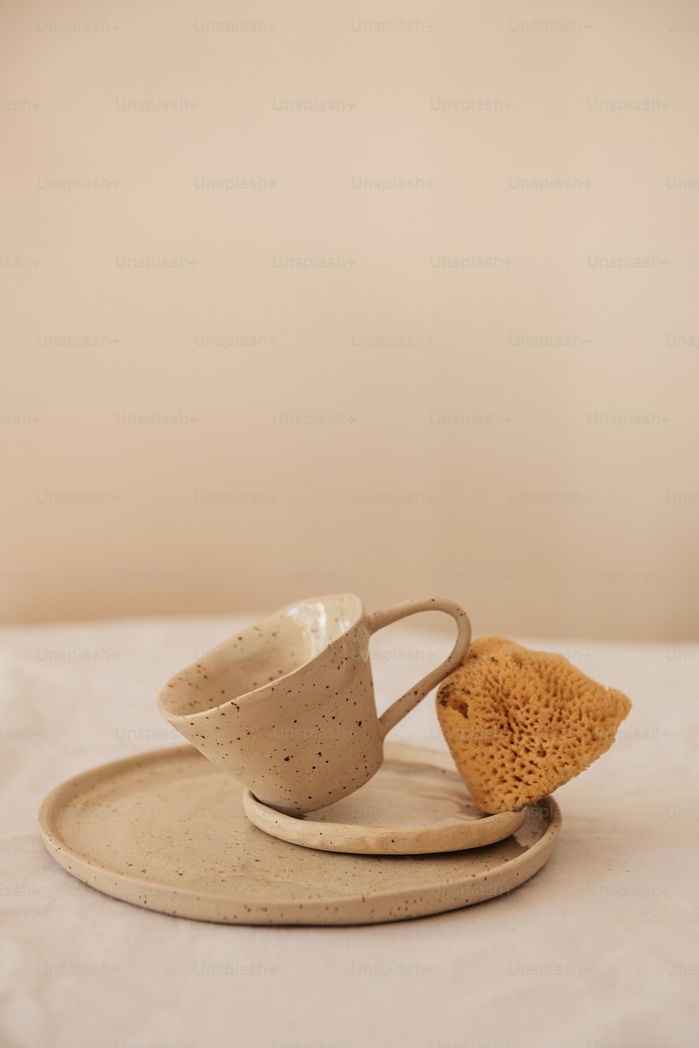 a cup and saucer sitting on top of a plate