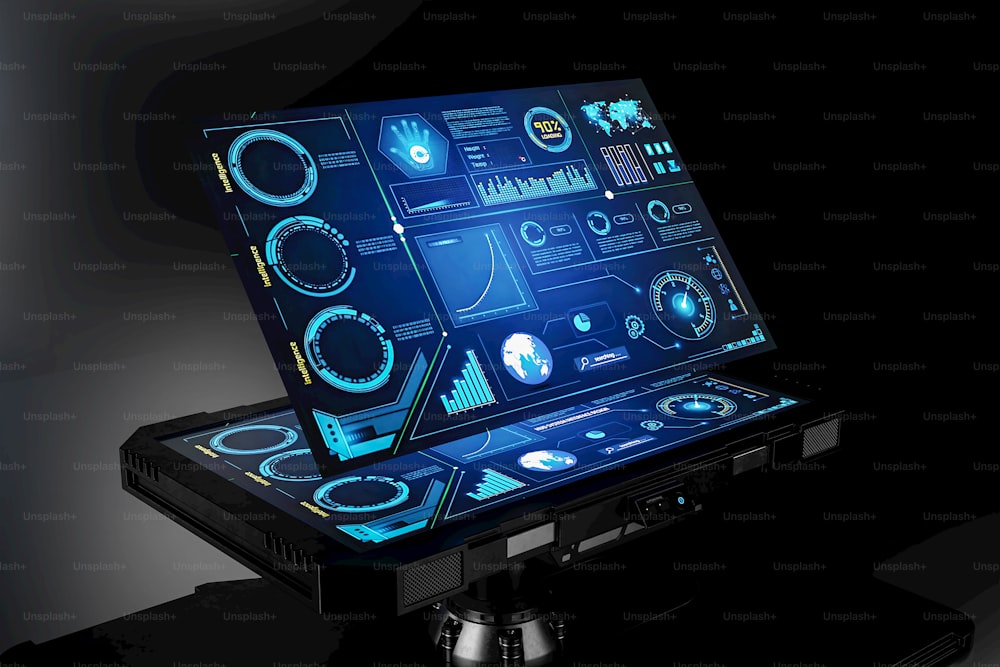 a laptop with a futuristic display on top of it