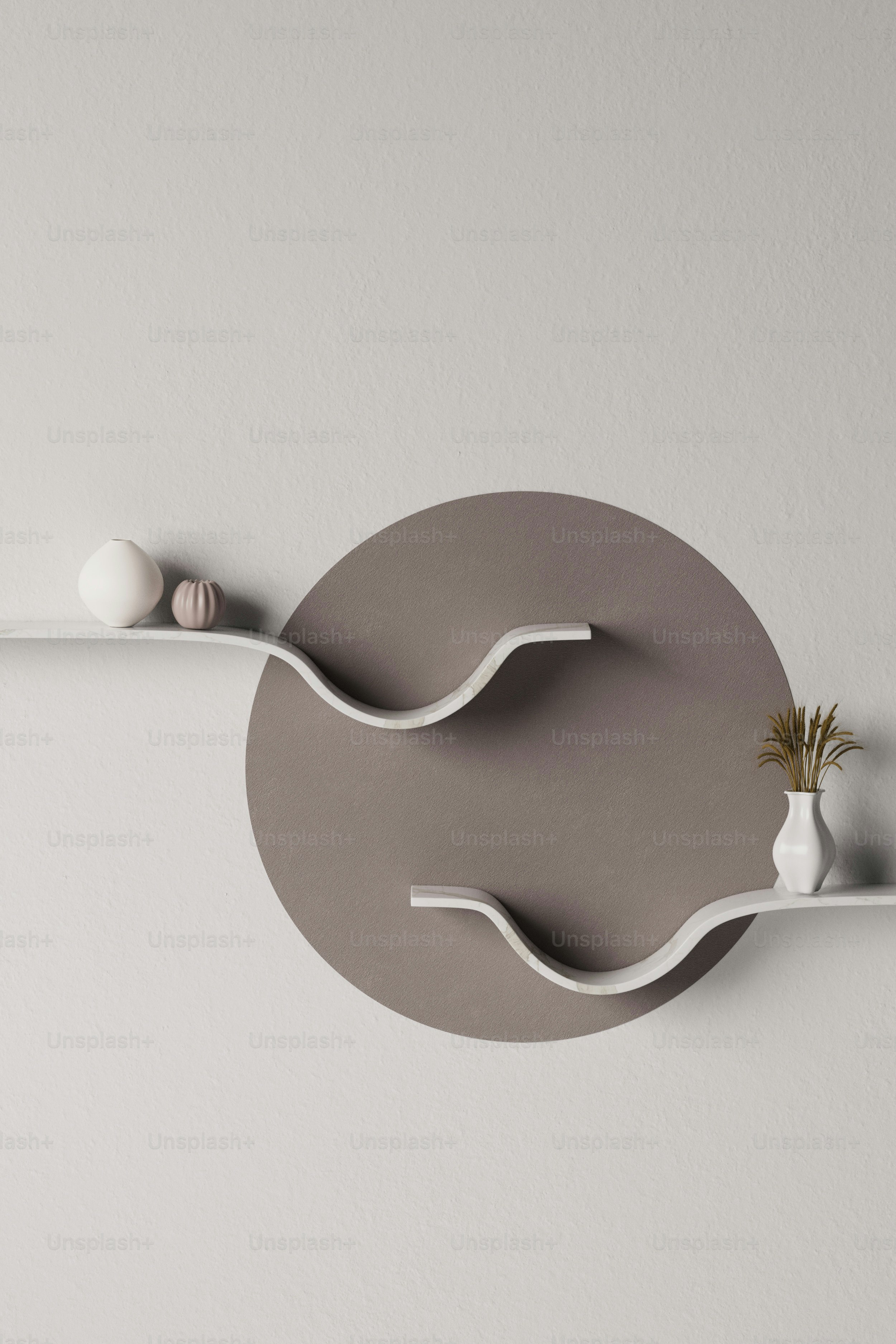 a white shelf with a vase and a plant on it