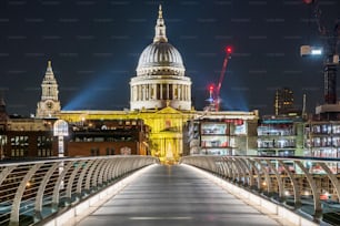 a view of a bridge with a building in the background