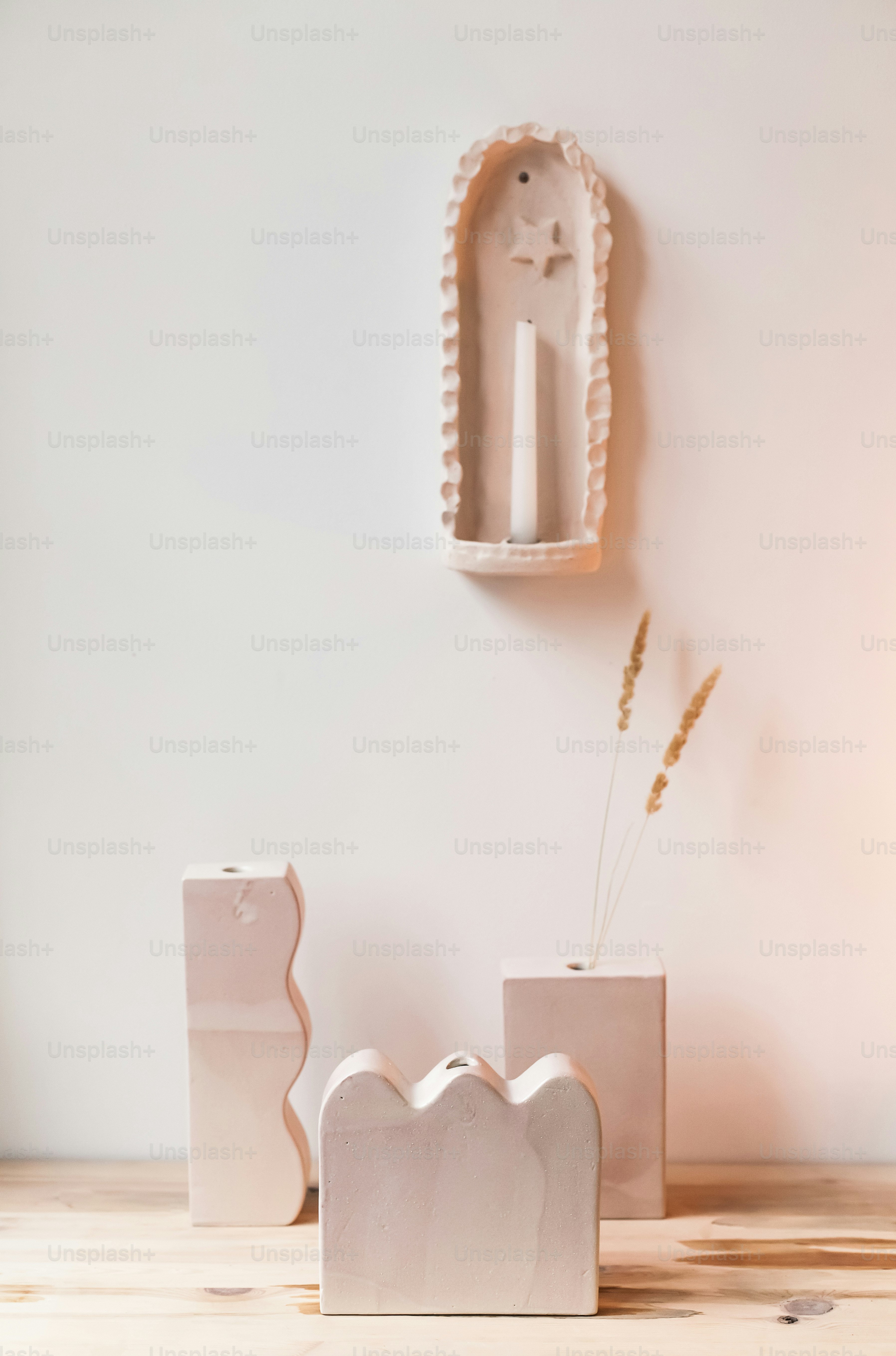 A white vase sitting on top of a wooden table photo – Aesthetic Image ...