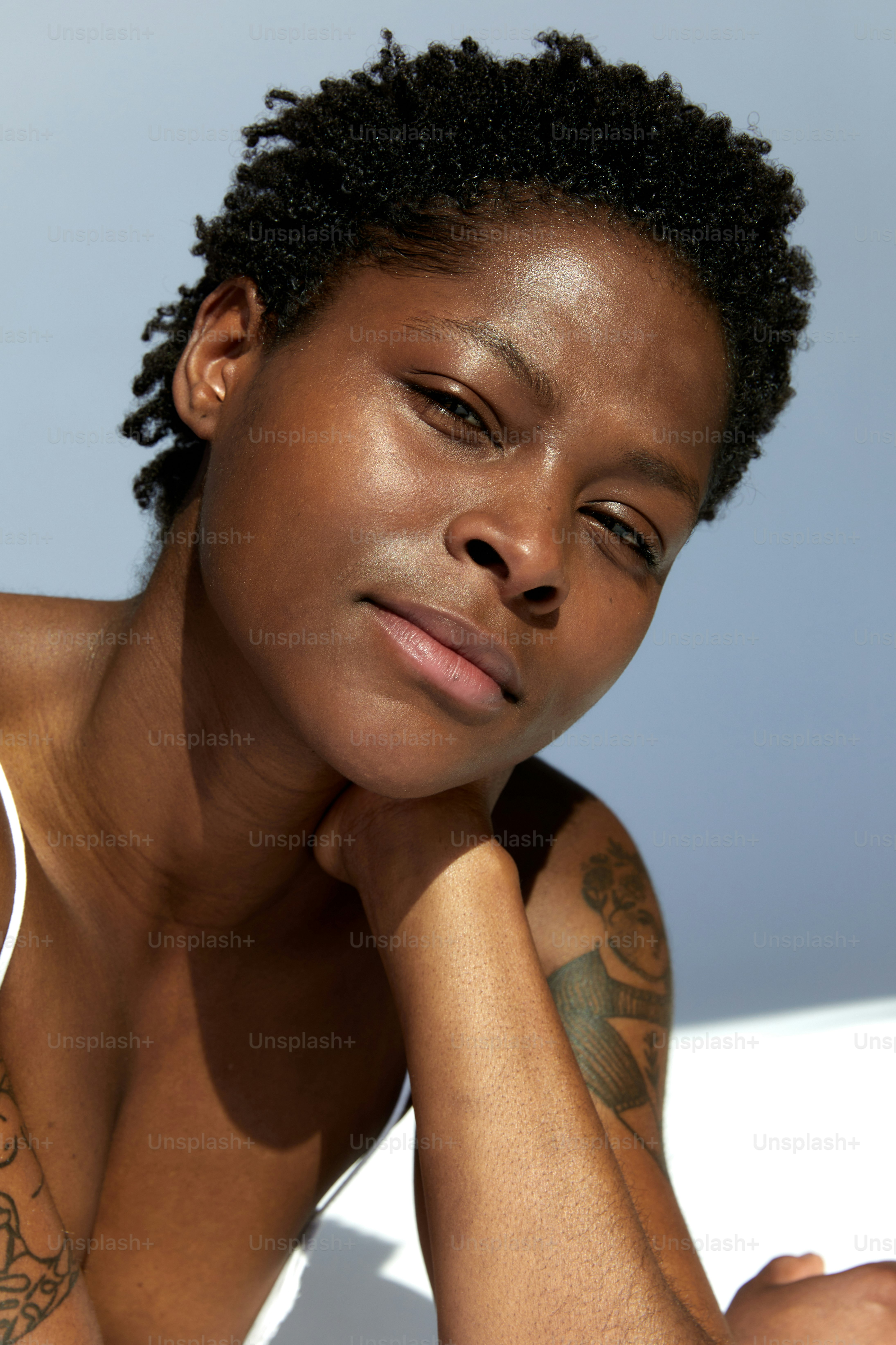 a close up of a person with tattoos
