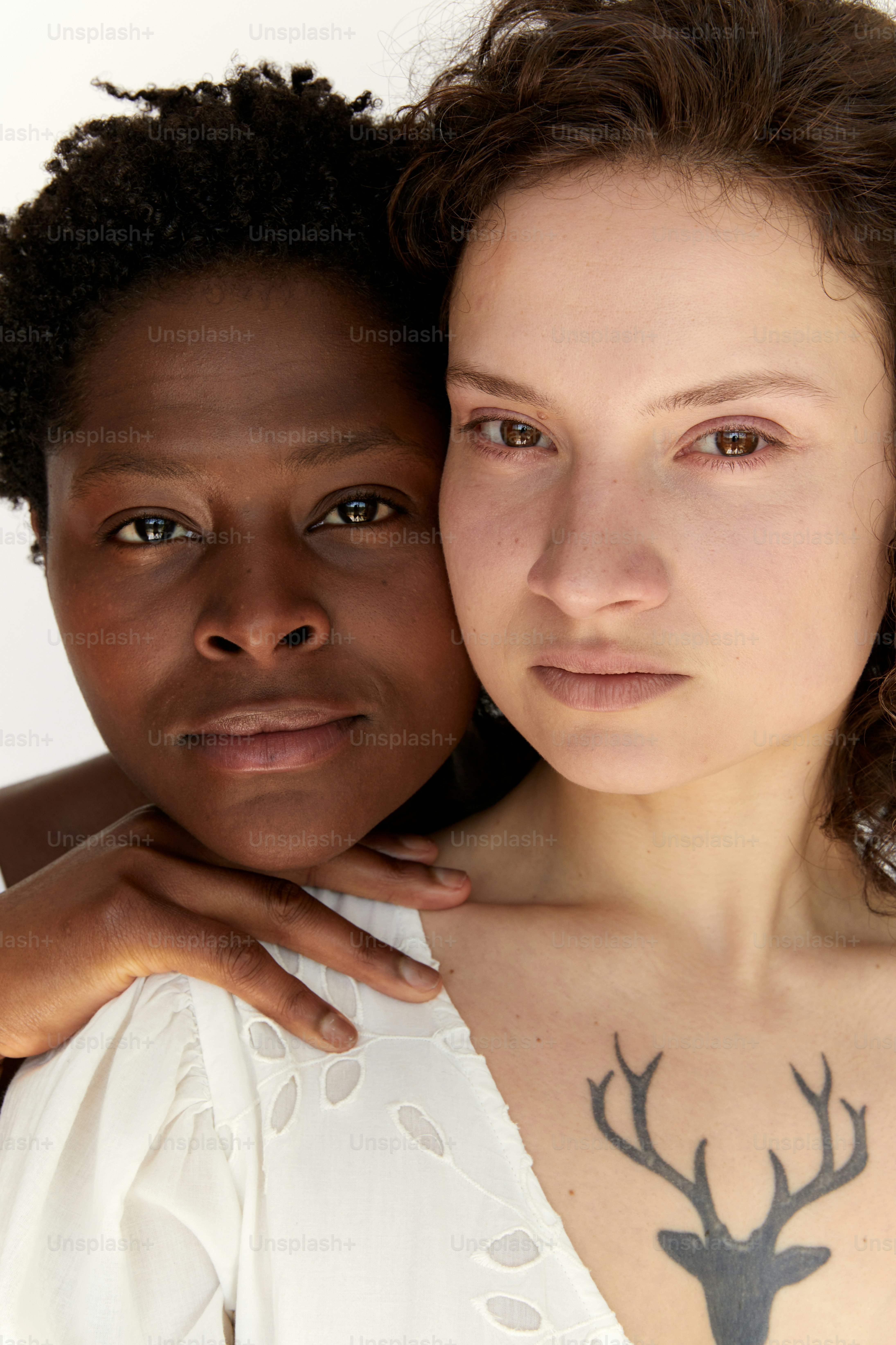 a couple of women standing next to each other