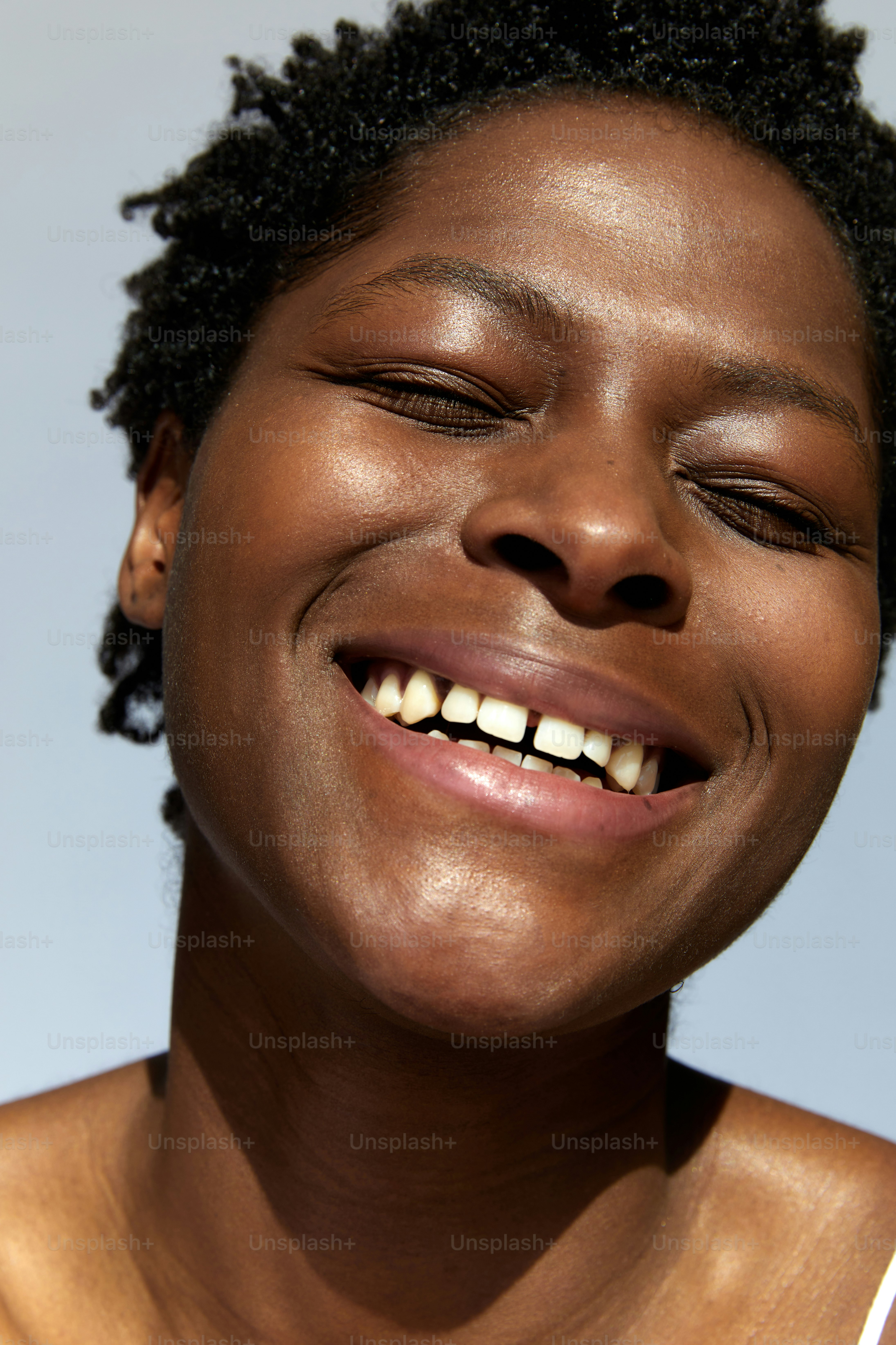 a close up of a person with a cell phone