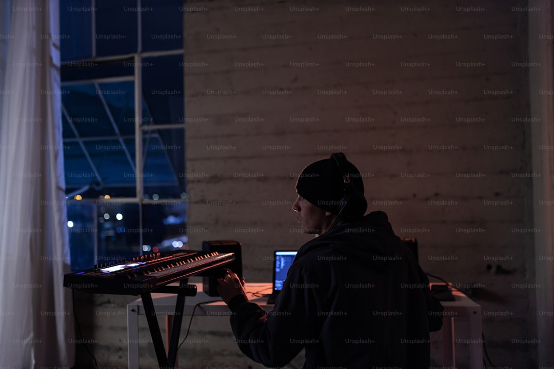 a woman standing in front of a keyboard