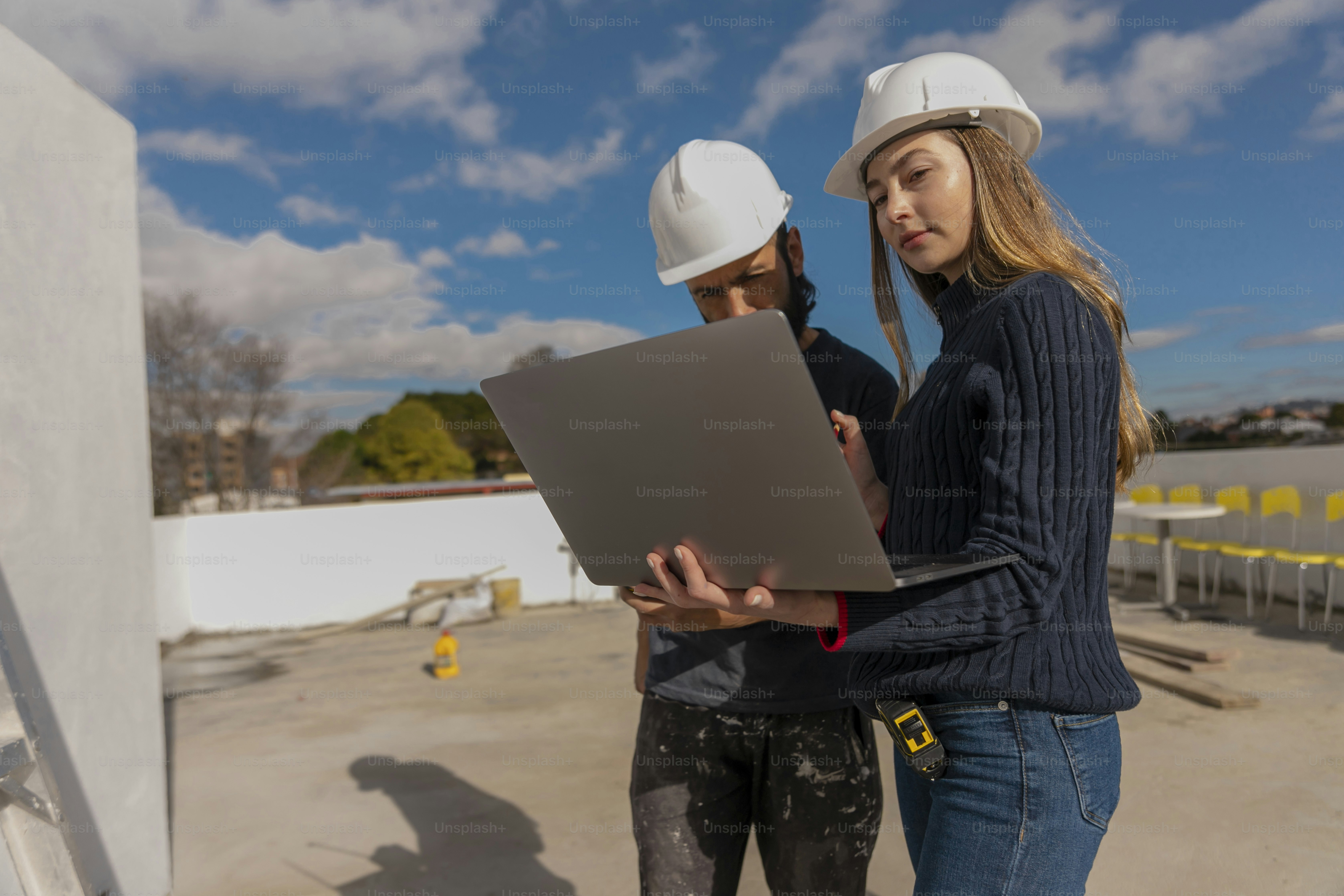 a couple of people standing next to each other