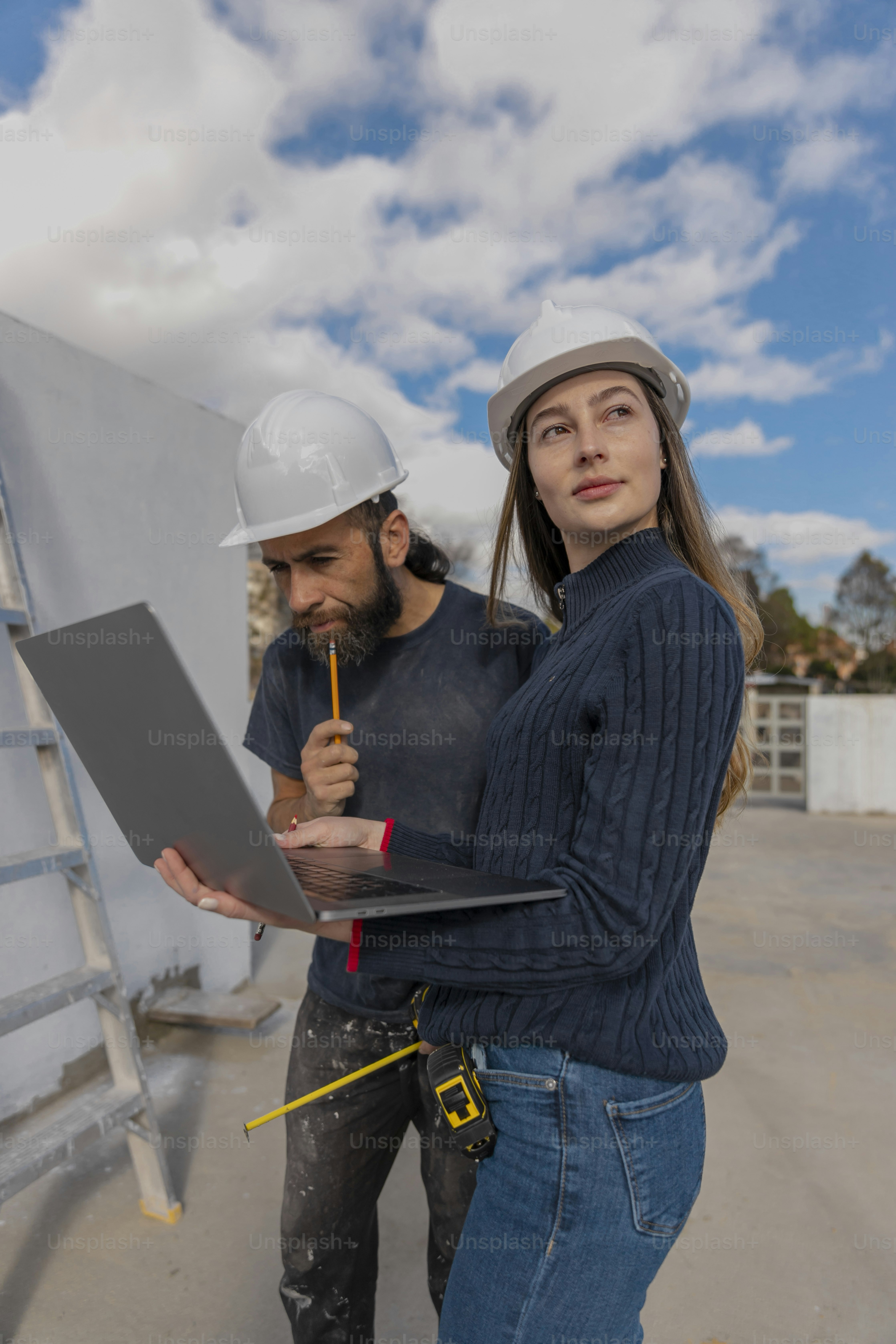a man and a woman standing next to each other