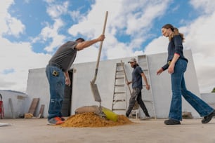 a couple of people that are standing in the dirt