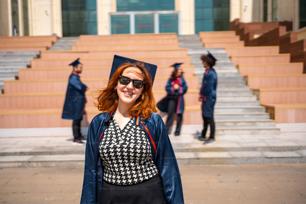 a woman wearing a graduation cap and gown