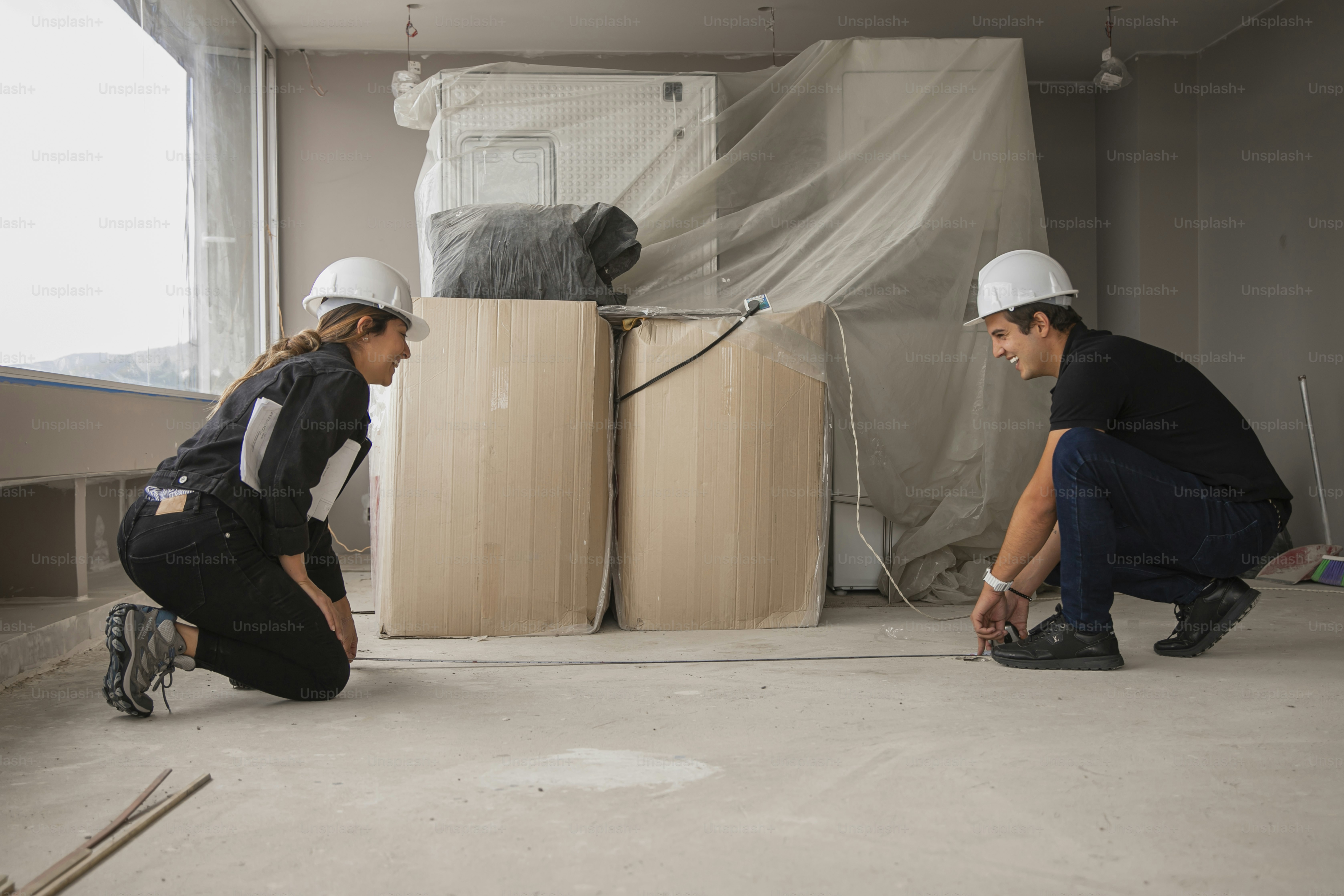 a couple of people that are kneeling down