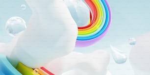 un cepillo de dientes de color arco iris con gotas de agua a su alrededor