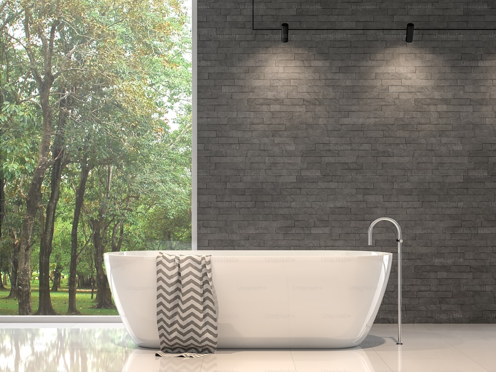 Salle de bain contemporaine moderne 3D rendu, Il y a un mur de briques en pierre de nature grise et un sol en carreaux blancs. La chambre dispose de grandes fenêtres. Regardant dehors pour voir la vue sur le jardin.