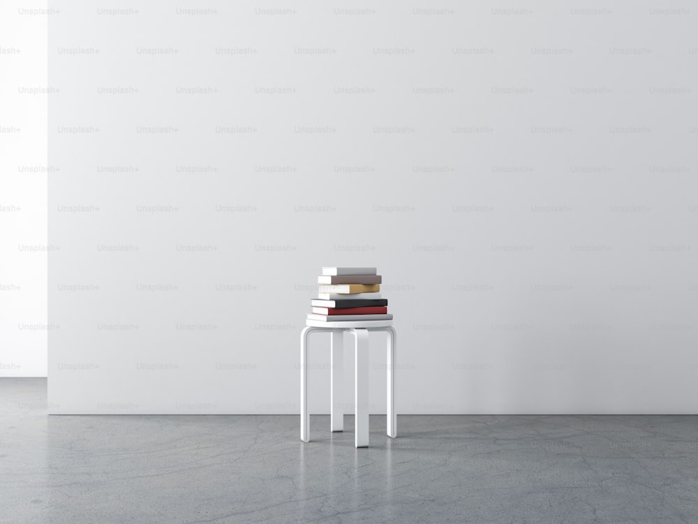 빈 방에 책 모형이 쌓여 있는 흰색 합판 의자, 3d 렌더링