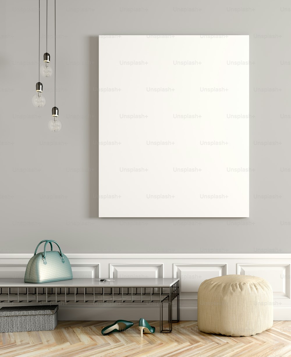 白いモックアップポスター3Dレンダリングを持つ灰色の壁にベンチとオットマンを持つモダンなホールのインテリアデザイン