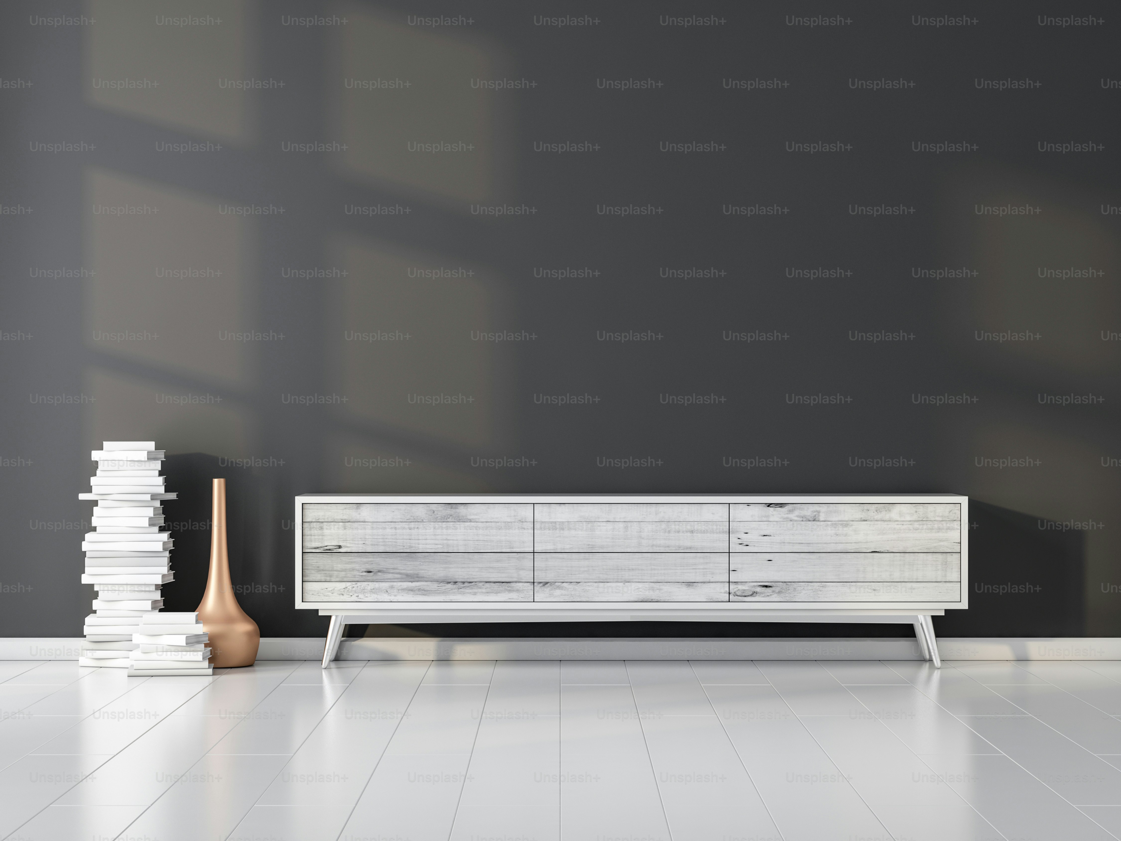 Modern white bureau or tv console mockup in living room with gray wall, 3d rendering