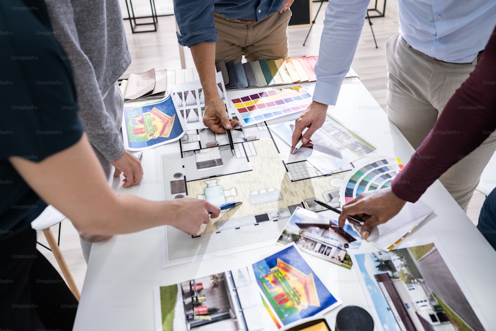 Architects And Designers Working On Color Selection For House