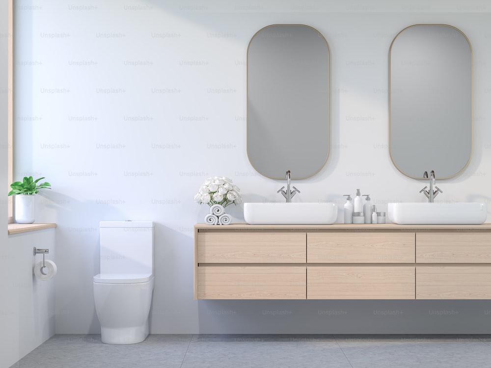 Minimal comtemporary style bathroom 3d render, The room has white walls and concrete tile floors decorated with wooden cabinets and golden glass frames. The sunlight enters the room.