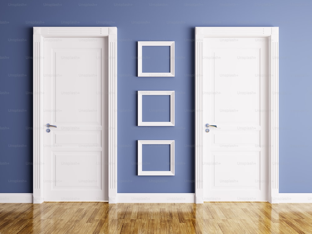 Interior of a room with two classic doors and frames