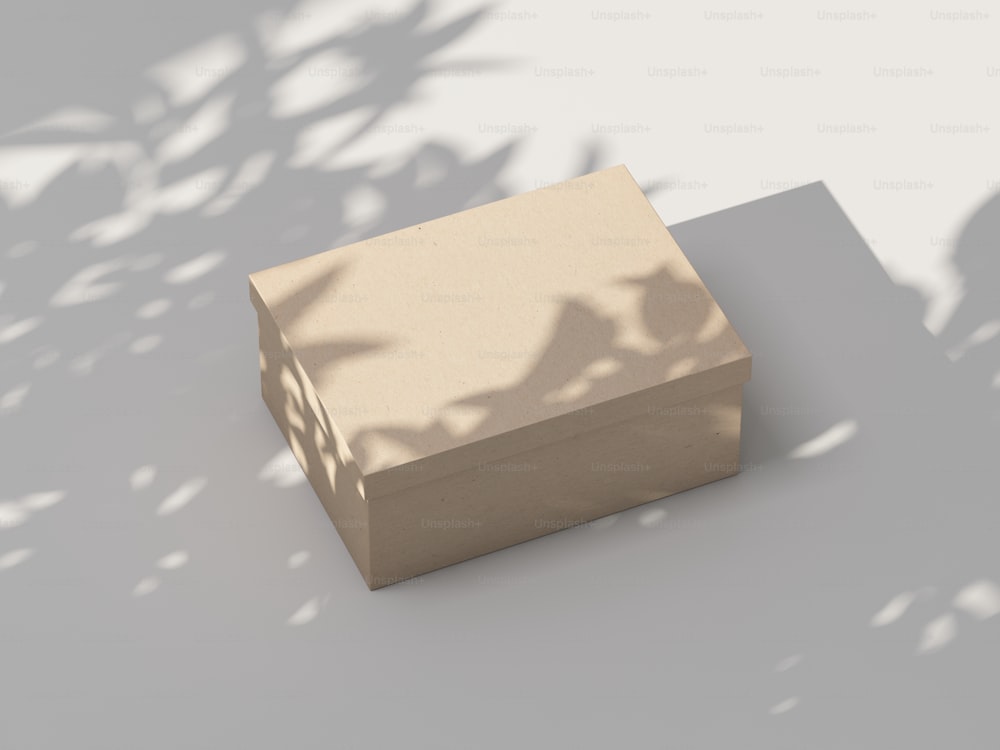 흰색 테이블에 크래프트 판지 상자 모형. 3D 렌더링
