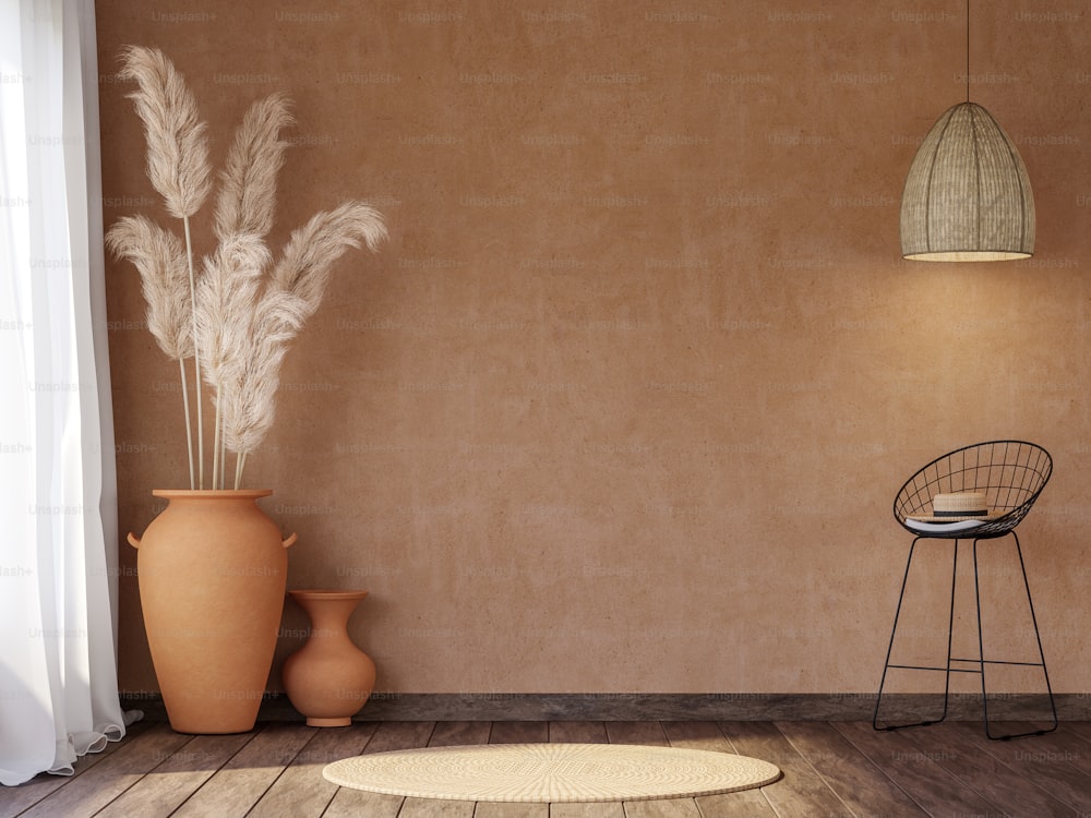 Leerer Raum im lokalen Stil mit leerer orangefarbener Wand 3D-Rendering, Es gibt alte Holzböden, die mit schwarzem Metallstuhl und Terrakottaglas mit trockener Schilfblume dekoriert sind.