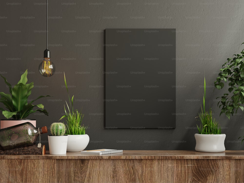 Mockup-Rahmen auf Schrank im Wohnzimmer-Innenraum auf leerem dunklem Wandhintergrund, 3D-Rendering
