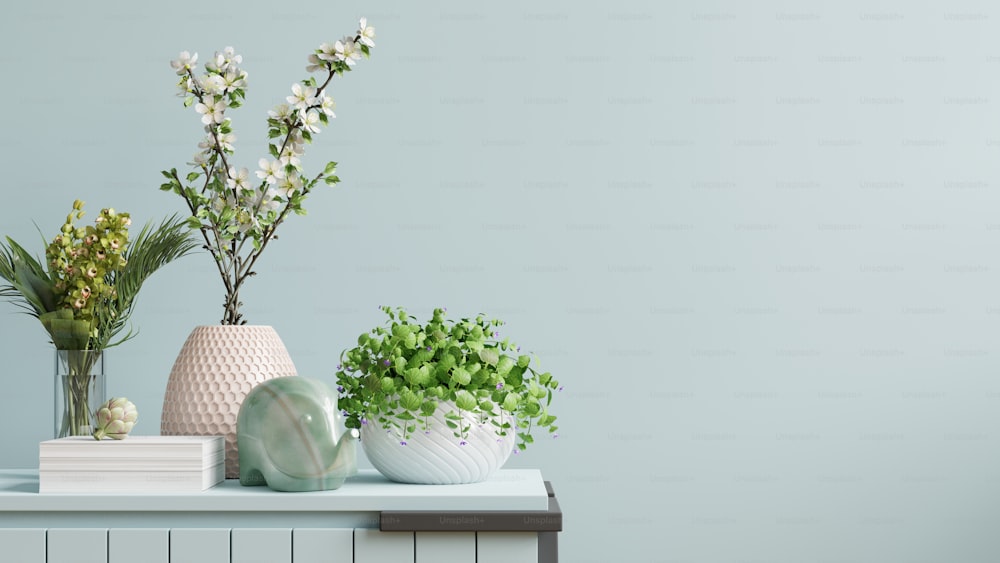 Interior wall mockup with green plant,Light blue wall and shelf.3D rendering