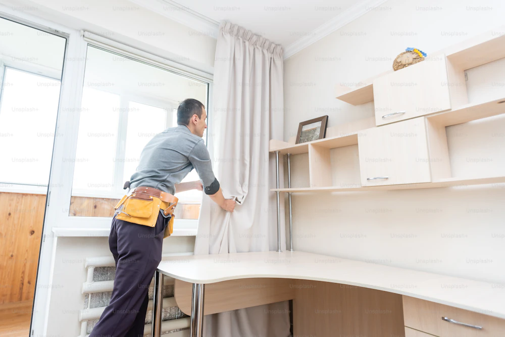 Handyman carrying out repair and improvement work inside a home