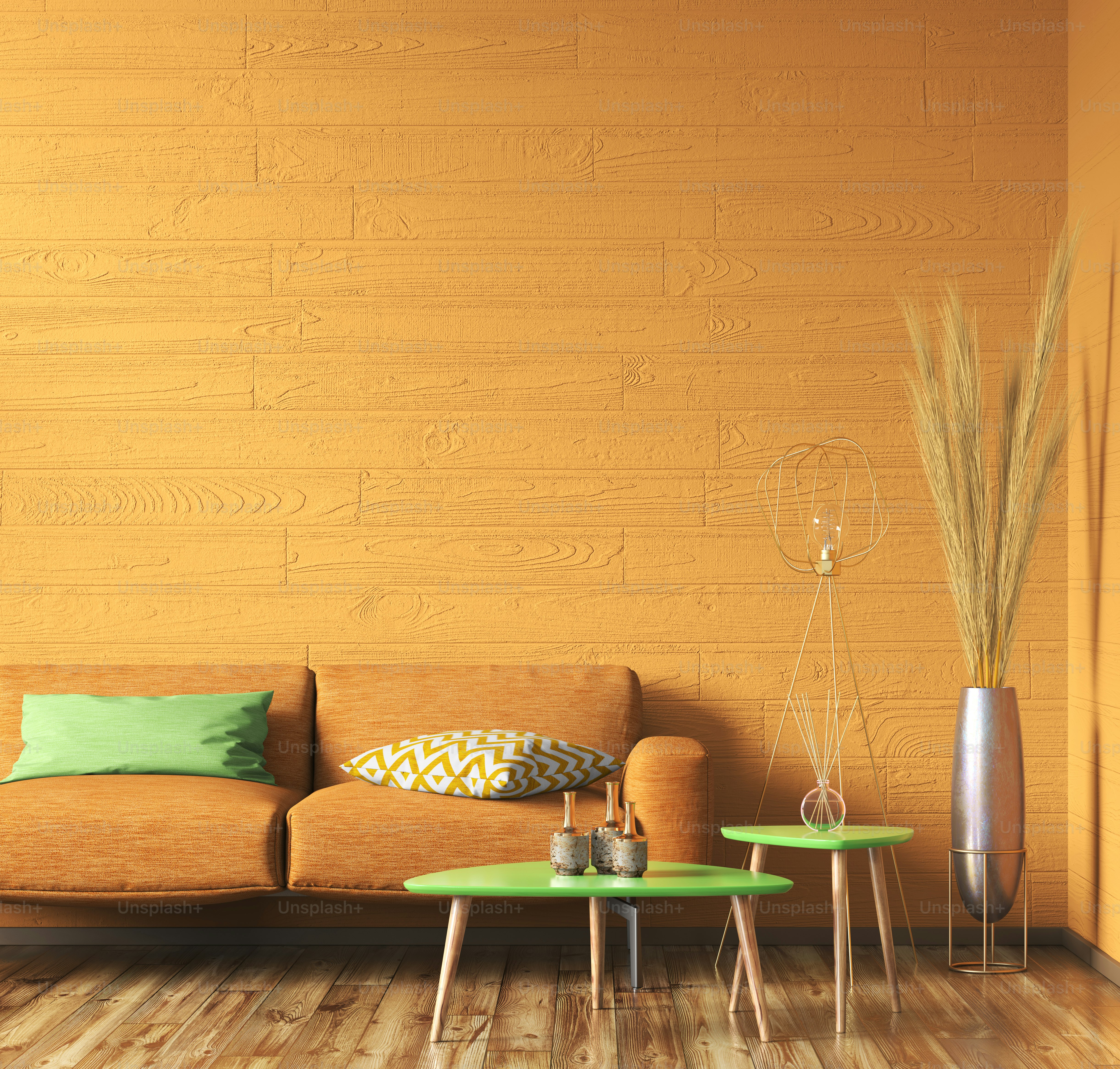 Desain interior ruang tamu modern yang berwarna-warni dan semarak dengan sofa oranye dan meja kopi hijau di atas dinding maket, desain rumah, rendering 3d