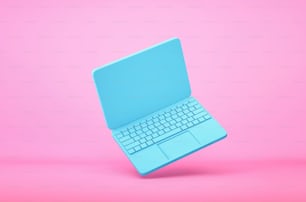 Blauer Laptop, der auf rosa Hintergrund fliegt. 3D-Rendering