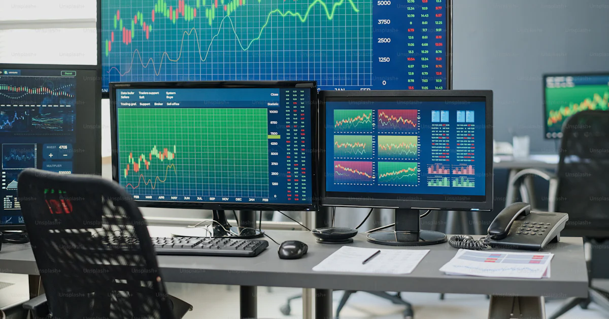 Trading Workspace Horizontal no people shot of stock and currency trading agents ...