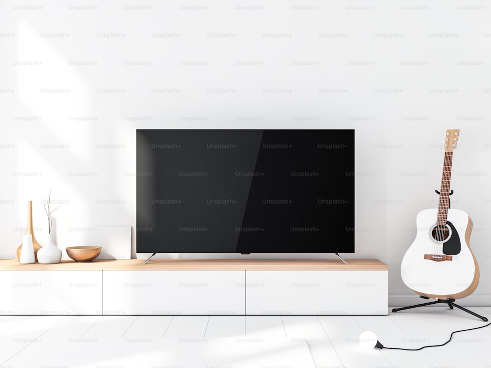 Modern Smart Tv Mockup with blank black screen standing on console, modern living room with acoustic guitar. 3d rendering