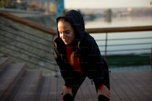 View at prety young woman exercising outside