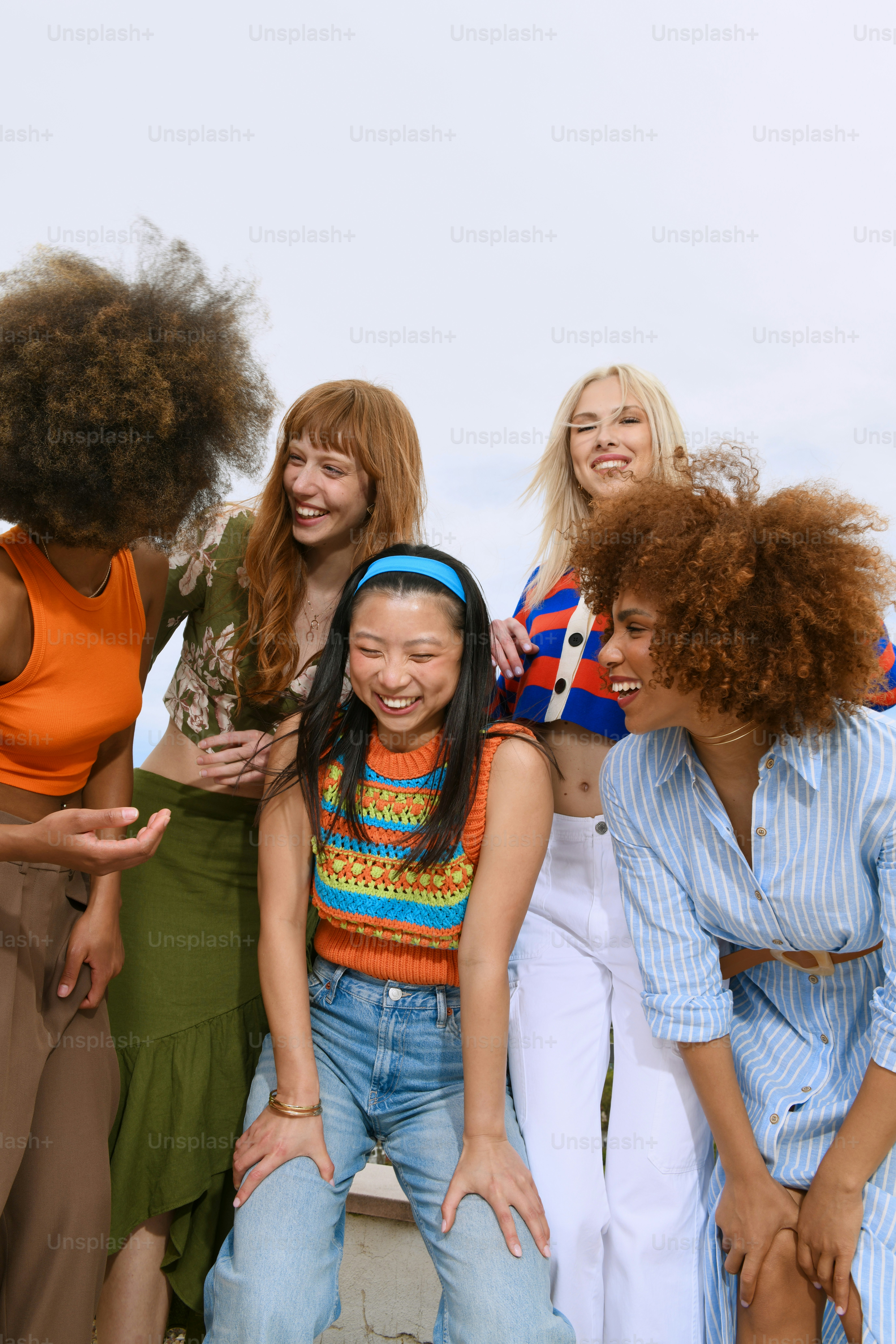 A group of young women standing next to each other photo – Friends ...