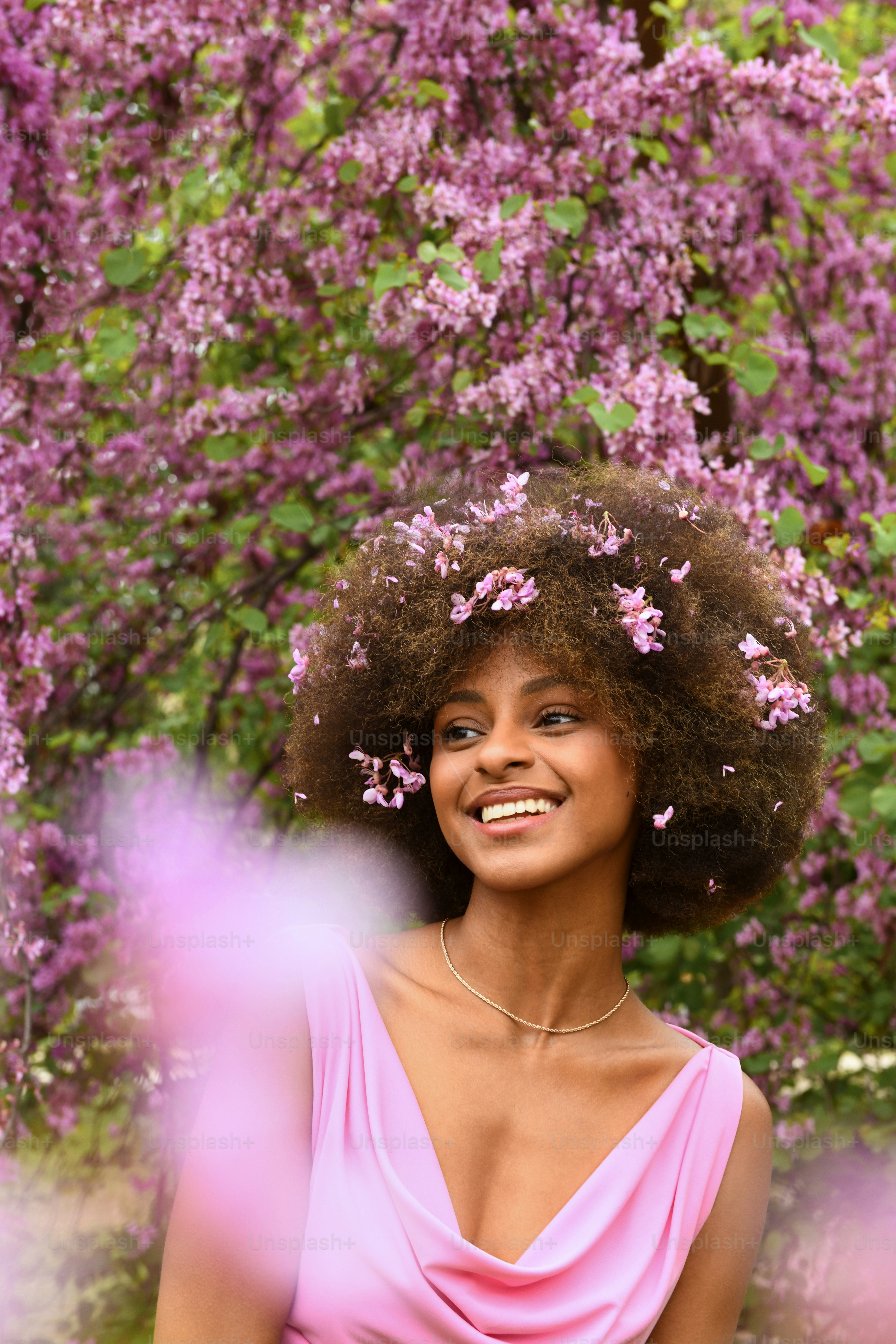 a woman with a flower in her hair
