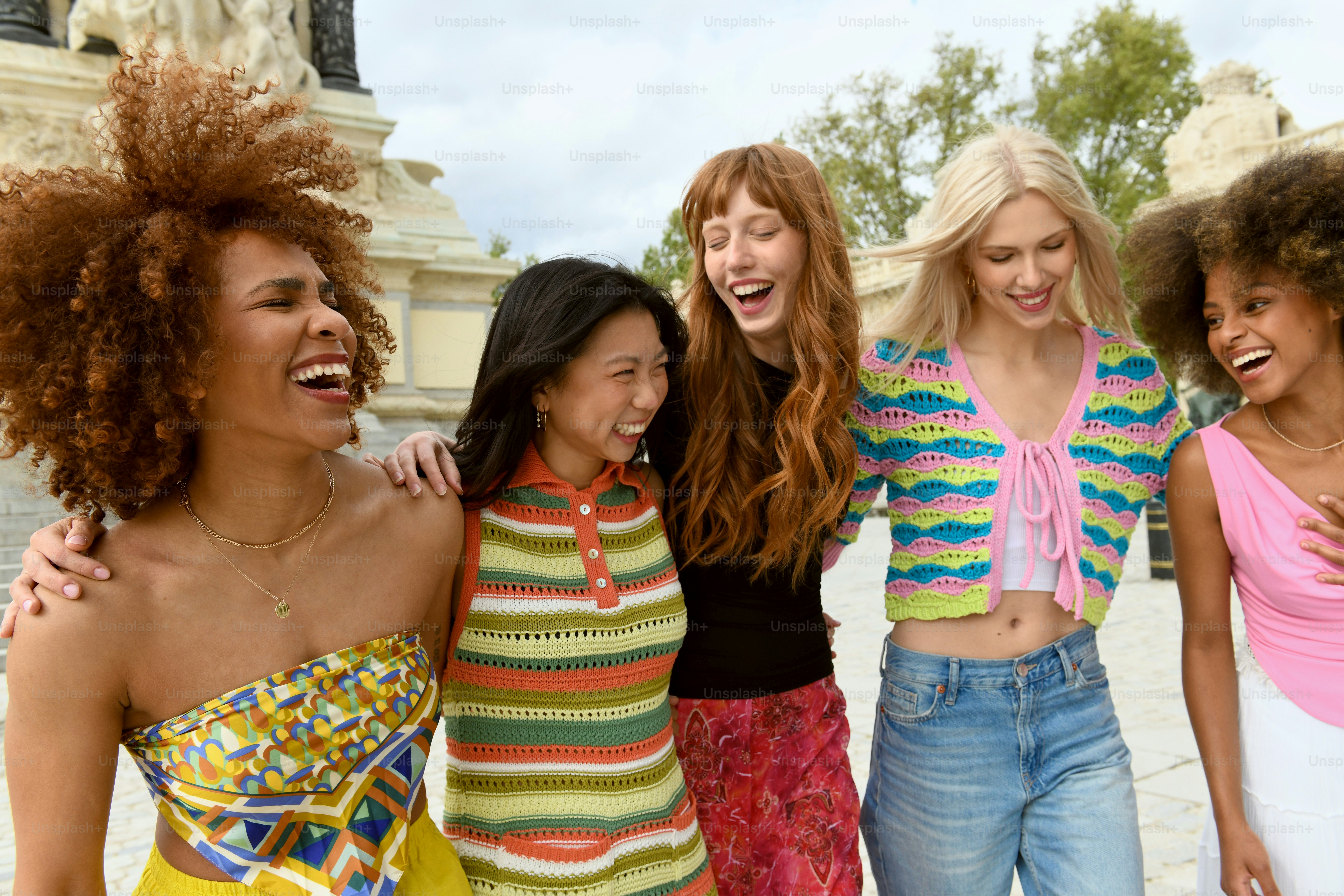 a group of young women standing next to each other