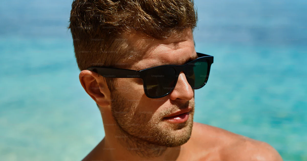 Buff Man Using Sunscreen Man Skin Care In Summer. Handsome Male With Sexy Body In Sunglasses ...