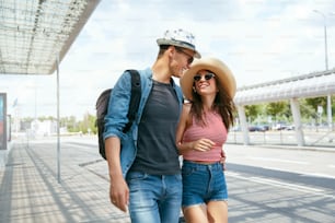 Couple Travel On Vacations. Happy People Near Airport Going On Summer Trip Together. High Resolution