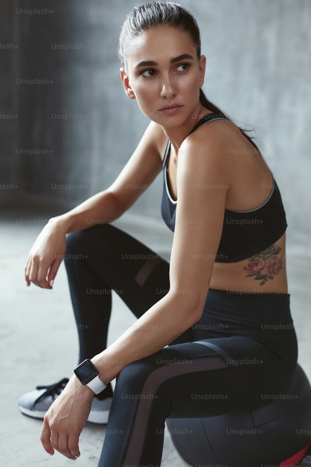Fitness Woman In Fashion Sportswear Sitting On Med Ball After