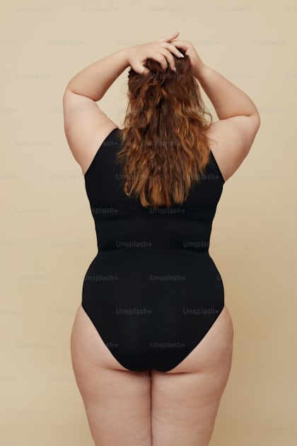 Plus Size Models. Full-figured Women Portrait. Brunette And Blonde In Black  Bodysuits Posing On Beige Background. Smiling Female Looking At Camera. Body  Positive As Lifestyle. photo – Only women Image on Unsplash