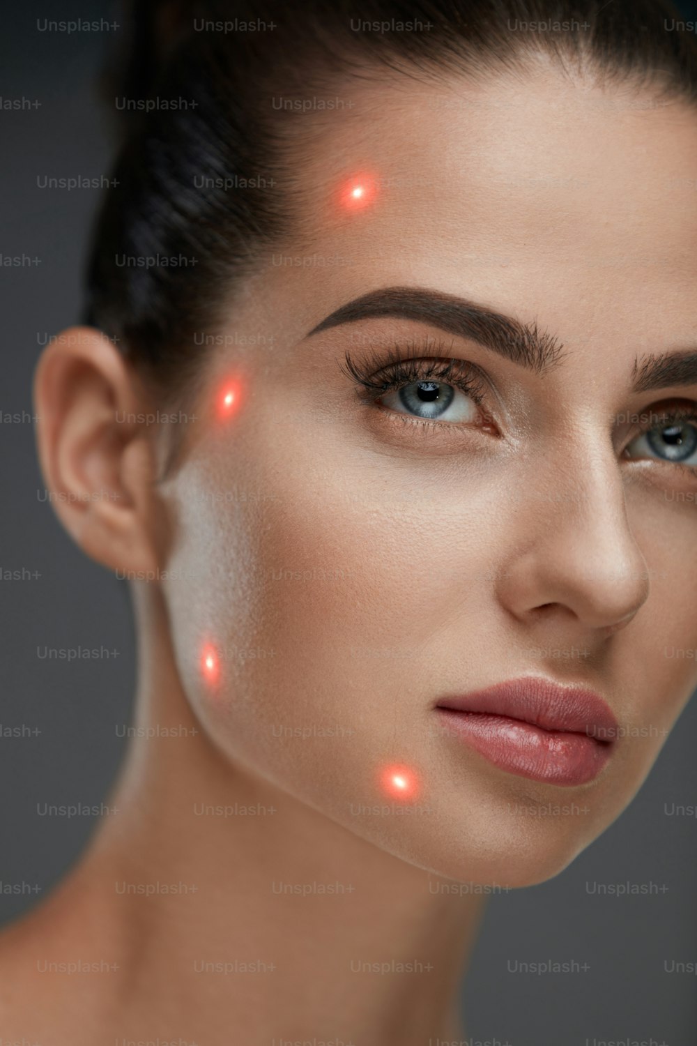 Cometology. Closeup Of Beautiful Sexy Woman Face With Smooth Skin And Perfect Makeup. Portrait Of Girl Before Plastic Surgery With Laser Marks On Facial Skin. Cosmetic Treatment. High Resolution