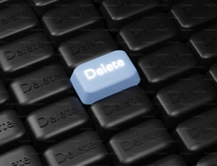 un teclado de computadora con un botón azul Eliminar