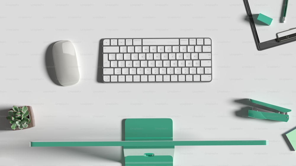un teclado y un mouse de computadora en un escritorio