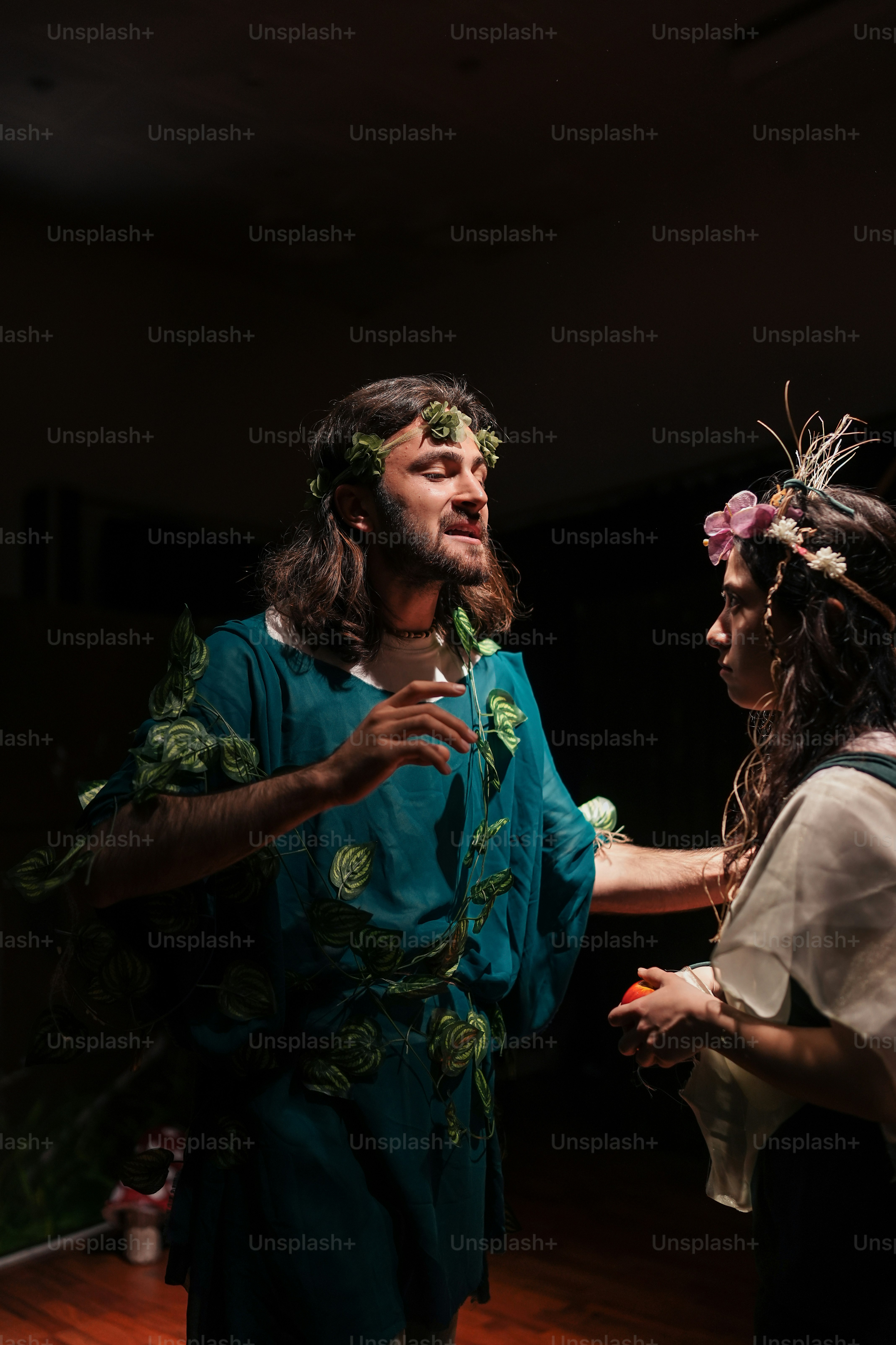 a man and a woman dressed in costumes